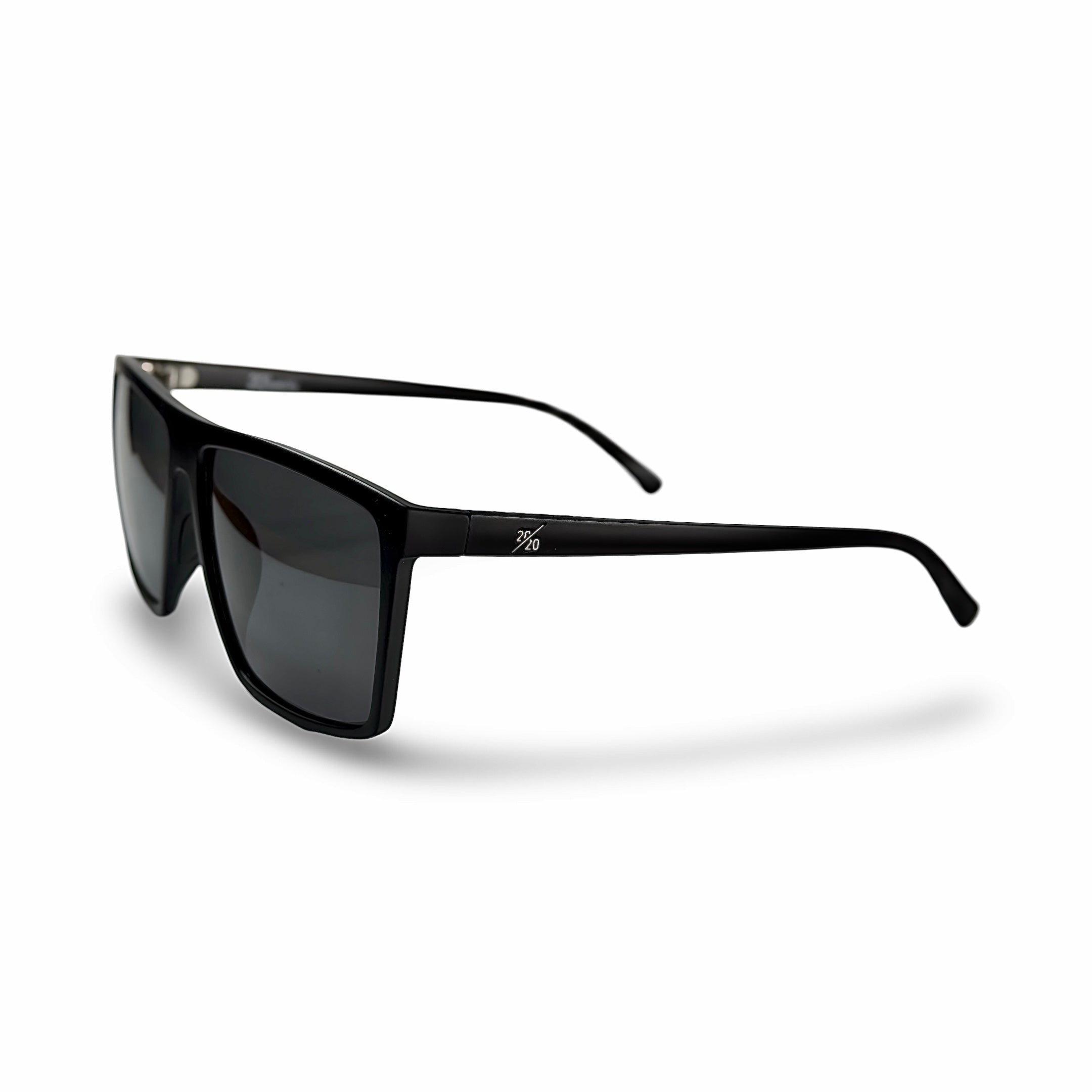 A pair of black-framed sunglasses with grey lenses displayed against a neutral background.
